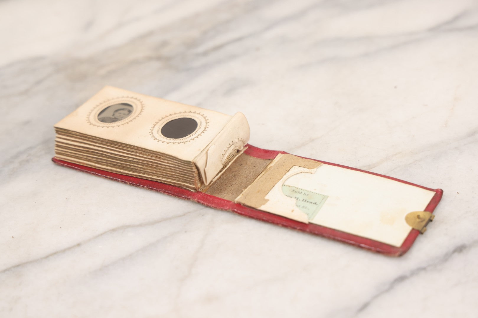 Lot 141 - Antique Gem Tintype Album With 26 Gem Tintype Photographs Including Man In Uniform, Note Binding In Poor Condition