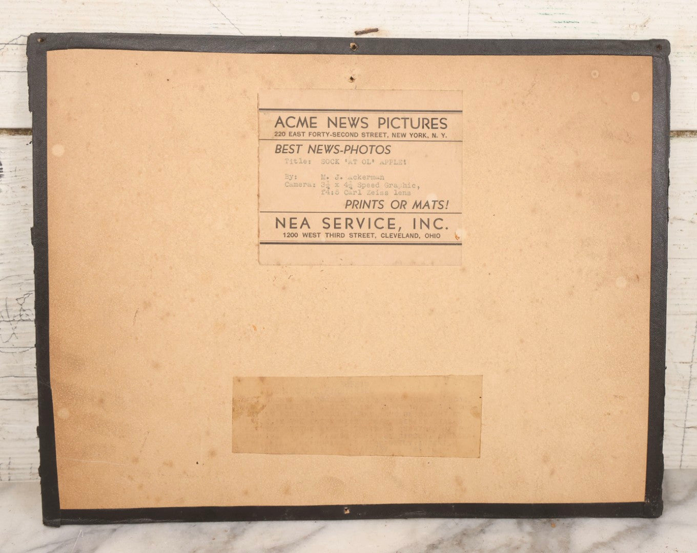 Lot 142 - Vintage Press Photograph “Sock 'At Ol' Apple!” By M. J. Ackerman For Acme News Pictures, Depicting Circus Elephants Playing Baseball With Trainer