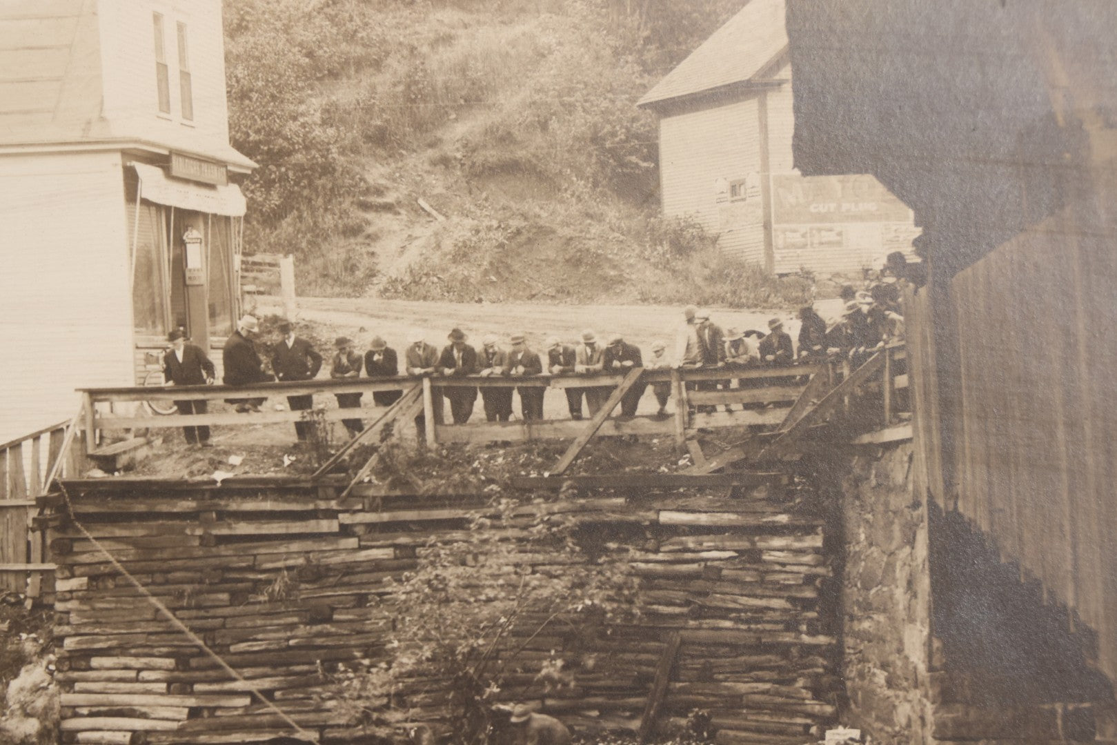 Lot 143 - Antique Boarded Photograph Of Crowd Overlooking Car Accident Scene Above River, Recovery In Progress, Photographed By Paquette, Beecher Falls, Vermont, Circa 1920