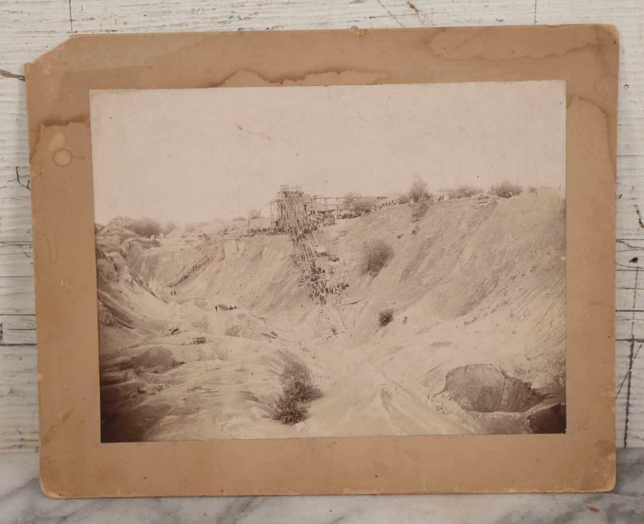 Lot 144 - Antique Boarded Occupational Photograph Of Large-Scale Quarry Or Excavation Site With Workers And Hoisting Structure