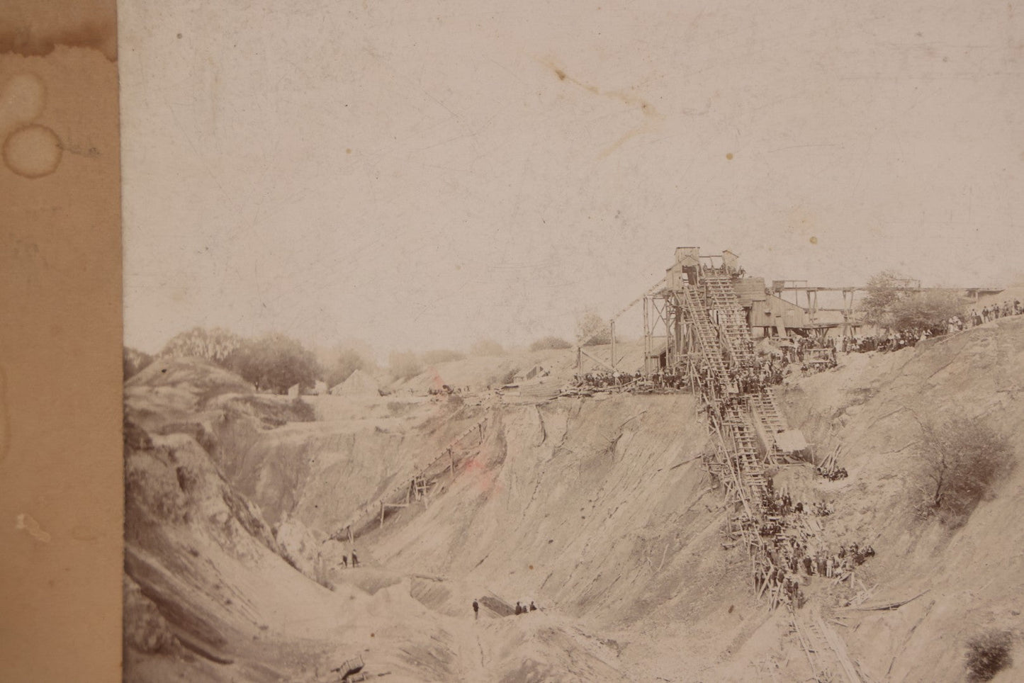 Lot 144 - Antique Boarded Occupational Photograph Of Large-Scale Quarry Or Excavation Site With Workers And Hoisting Structure