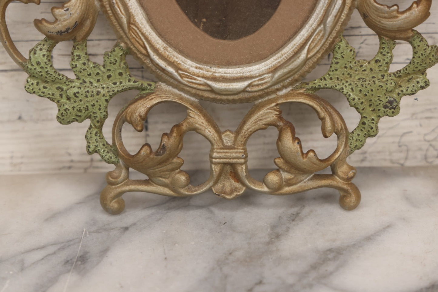 Lot 152 - Antique Decorative Cast Metal Frame With Silver, Gold, And Green Paint And Oval Portrait Of Man With Mustache