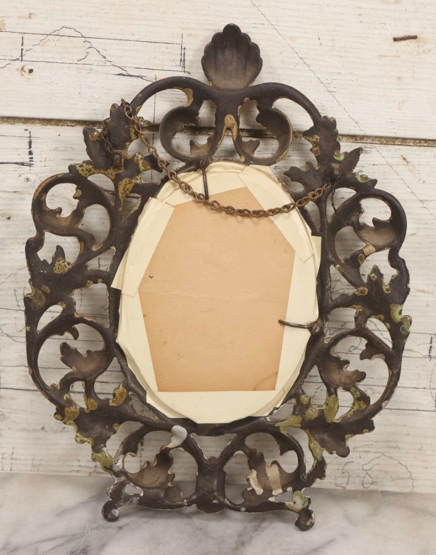 Lot 152 - Antique Decorative Cast Metal Frame With Silver, Gold, And Green Paint And Oval Portrait Of Man With Mustache