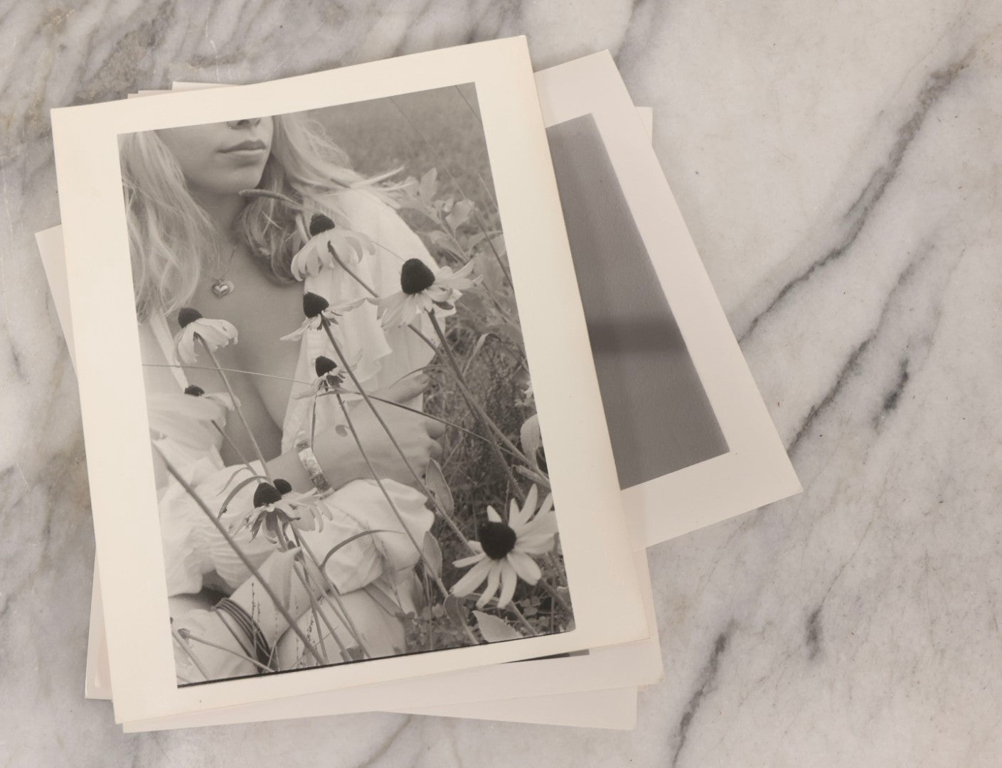 Lot 153 - Grouping Of 18 Vintage Black And White Art Photographs Of Women, Including Nude Studies, Smoking Portraits, And Evocative Posed Imagery