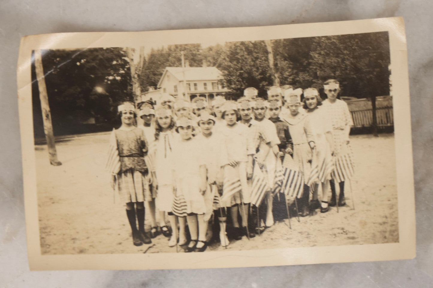 Lot 154 - Grouping Of Four Antique Snapshots Of Schoolchildren In Costume, Including Halloween Dress, Patriotic Headbands With Flags, And Children Holding Letter Signs