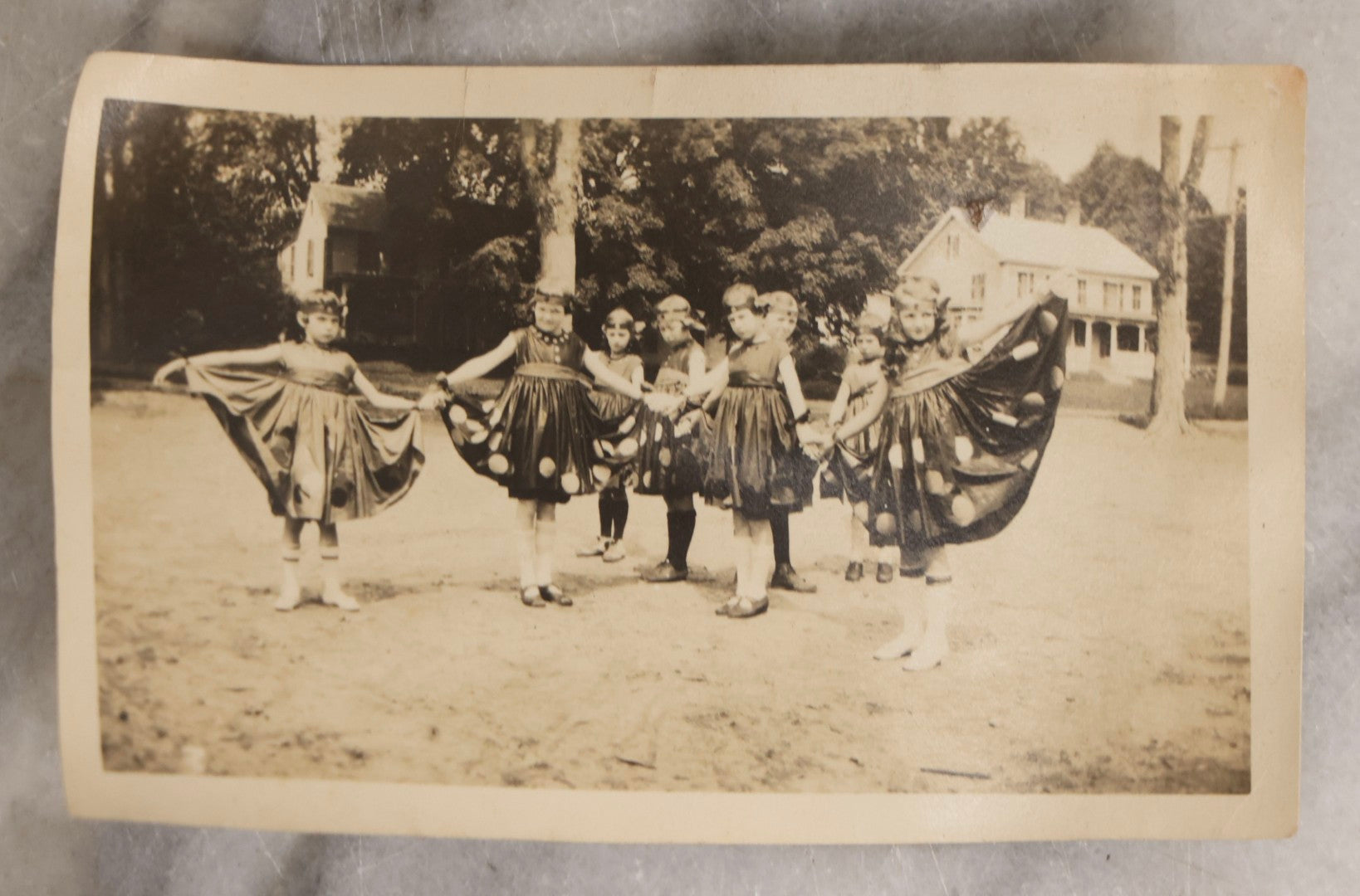 Lot 154 - Grouping Of Four Antique Snapshots Of Schoolchildren In Costume, Including Halloween Dress, Patriotic Headbands With Flags, And Children Holding Letter Signs