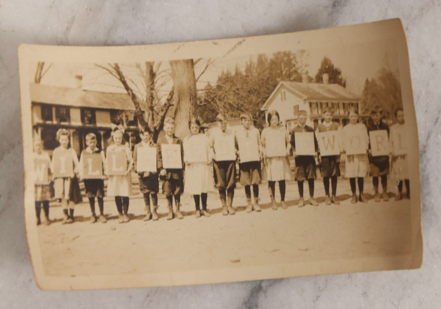 Lot 154 - Grouping Of Four Antique Snapshots Of Schoolchildren In Costume, Including Halloween Dress, Patriotic Headbands With Flags, And Children Holding Letter Signs