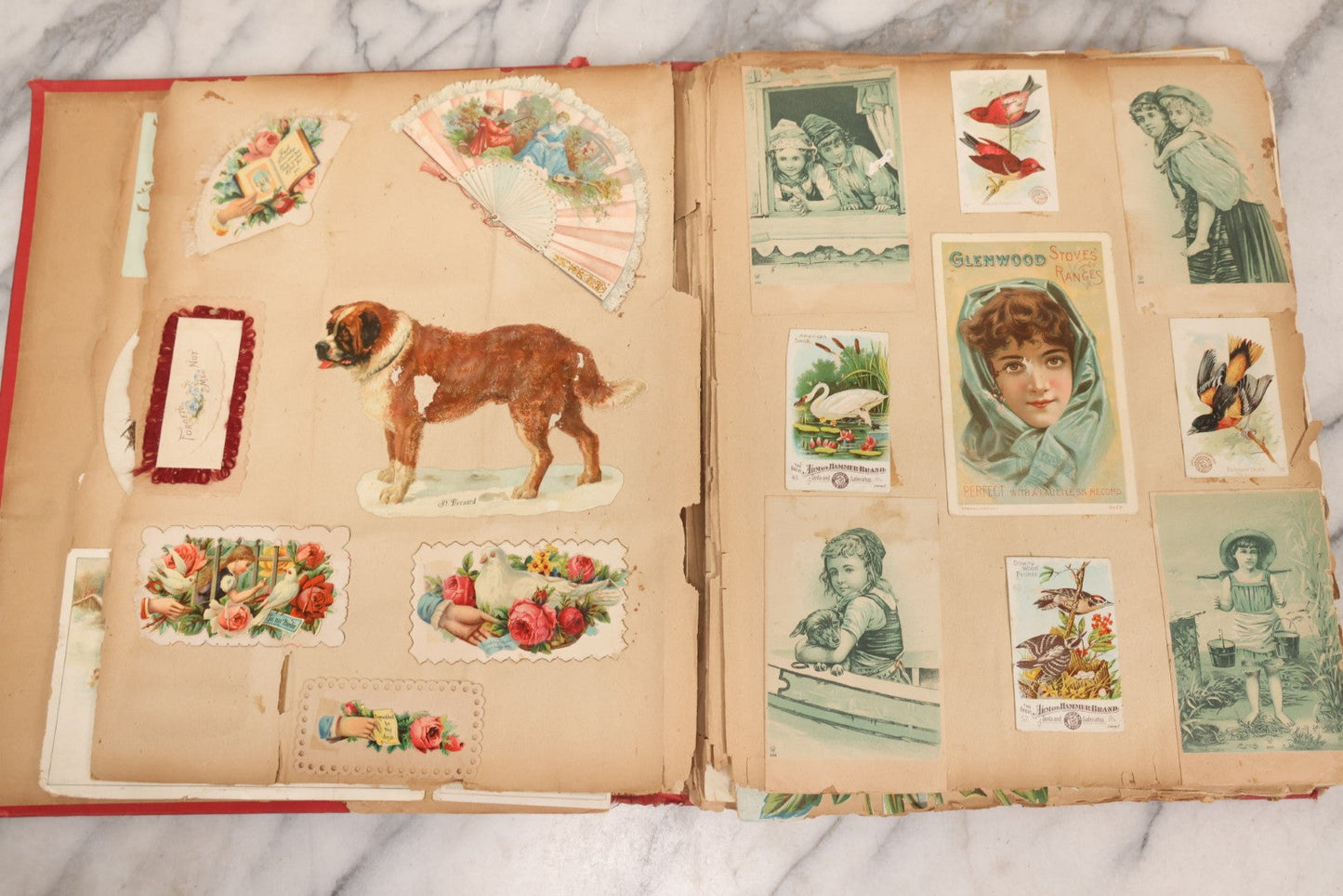 Lot 156 - Antique Victorian Trade Card And Die-Cut Scrapbook With Red Floral Cover, Containing 150+ Pieces, Pages Loose