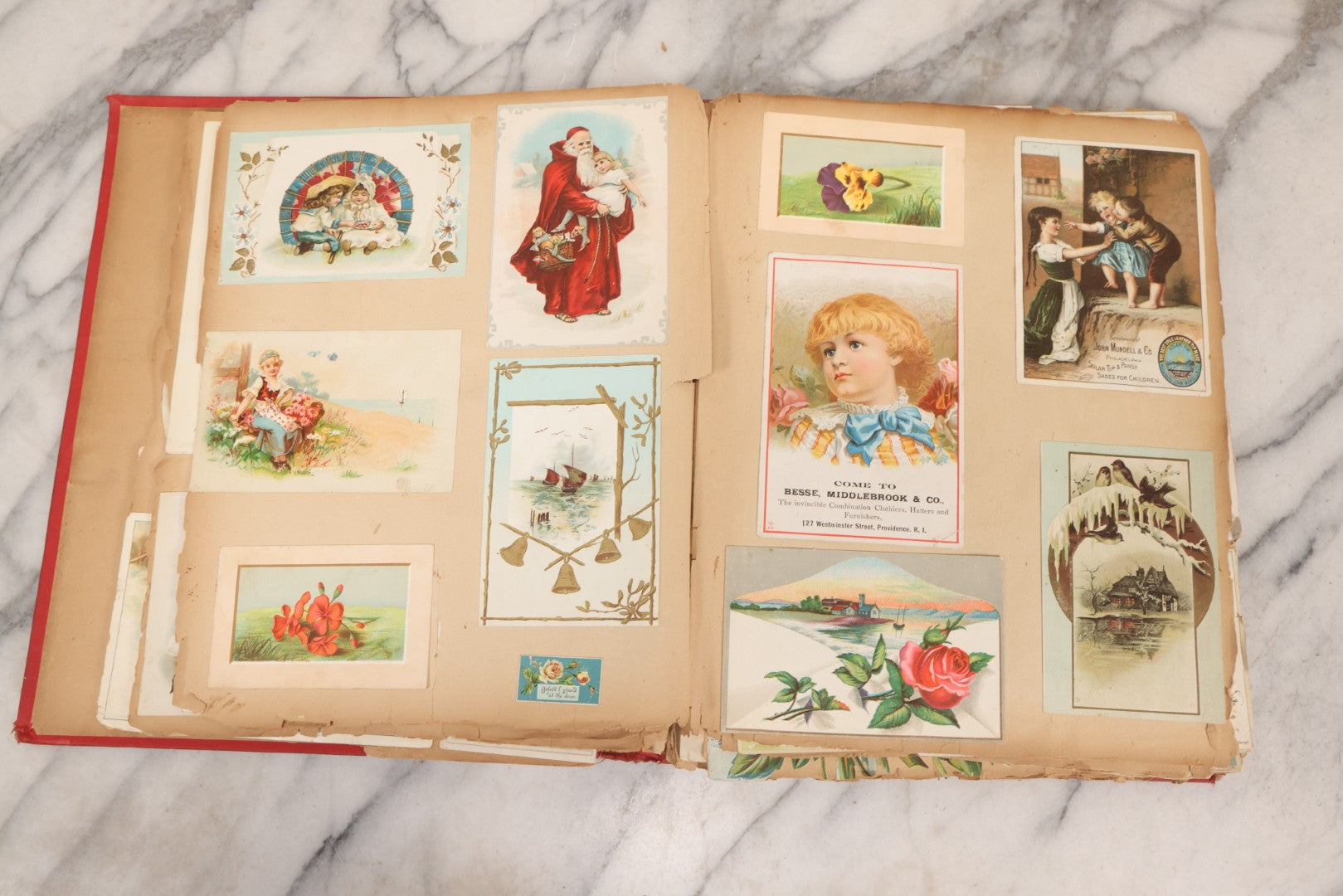 Lot 156 - Antique Victorian Trade Card And Die-Cut Scrapbook With Red Floral Cover, Containing 150+ Pieces, Pages Loose