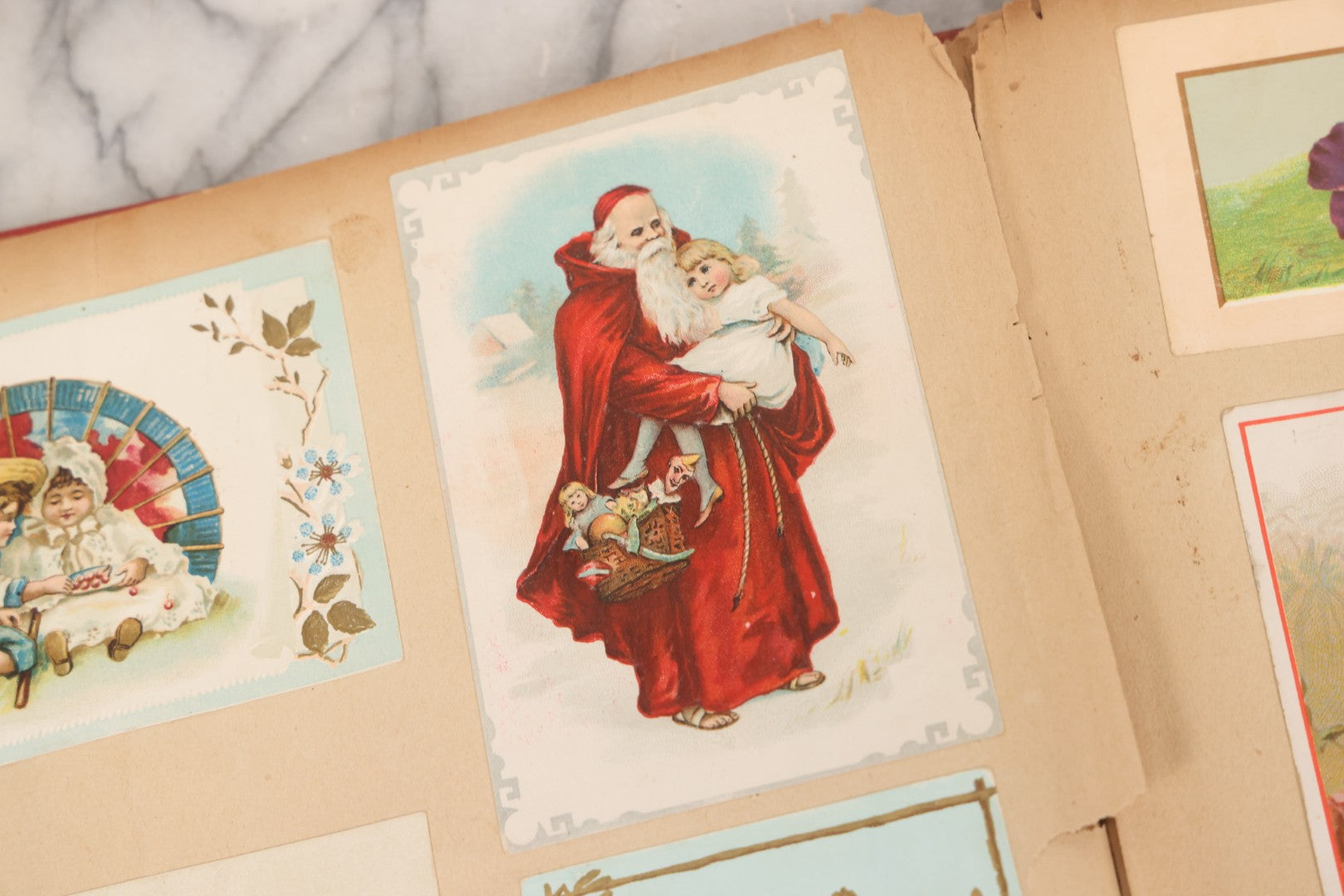 Lot 156 - Antique Victorian Trade Card And Die-Cut Scrapbook With Red Floral Cover, Containing 150+ Pieces, Pages Loose