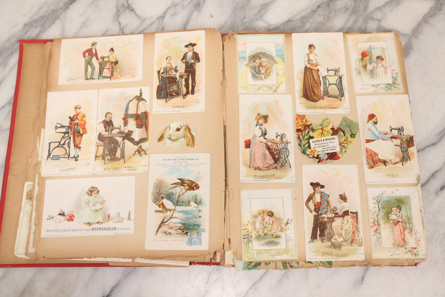 Lot 156 - Antique Victorian Trade Card And Die-Cut Scrapbook With Red Floral Cover, Containing 150+ Pieces, Pages Loose