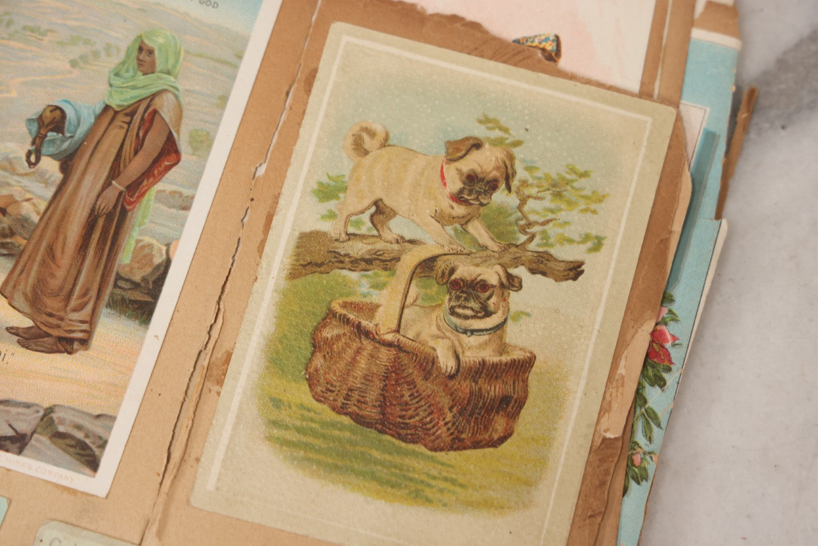 Lot 156 - Antique Victorian Trade Card And Die-Cut Scrapbook With Red Floral Cover, Containing 150+ Pieces, Pages Loose