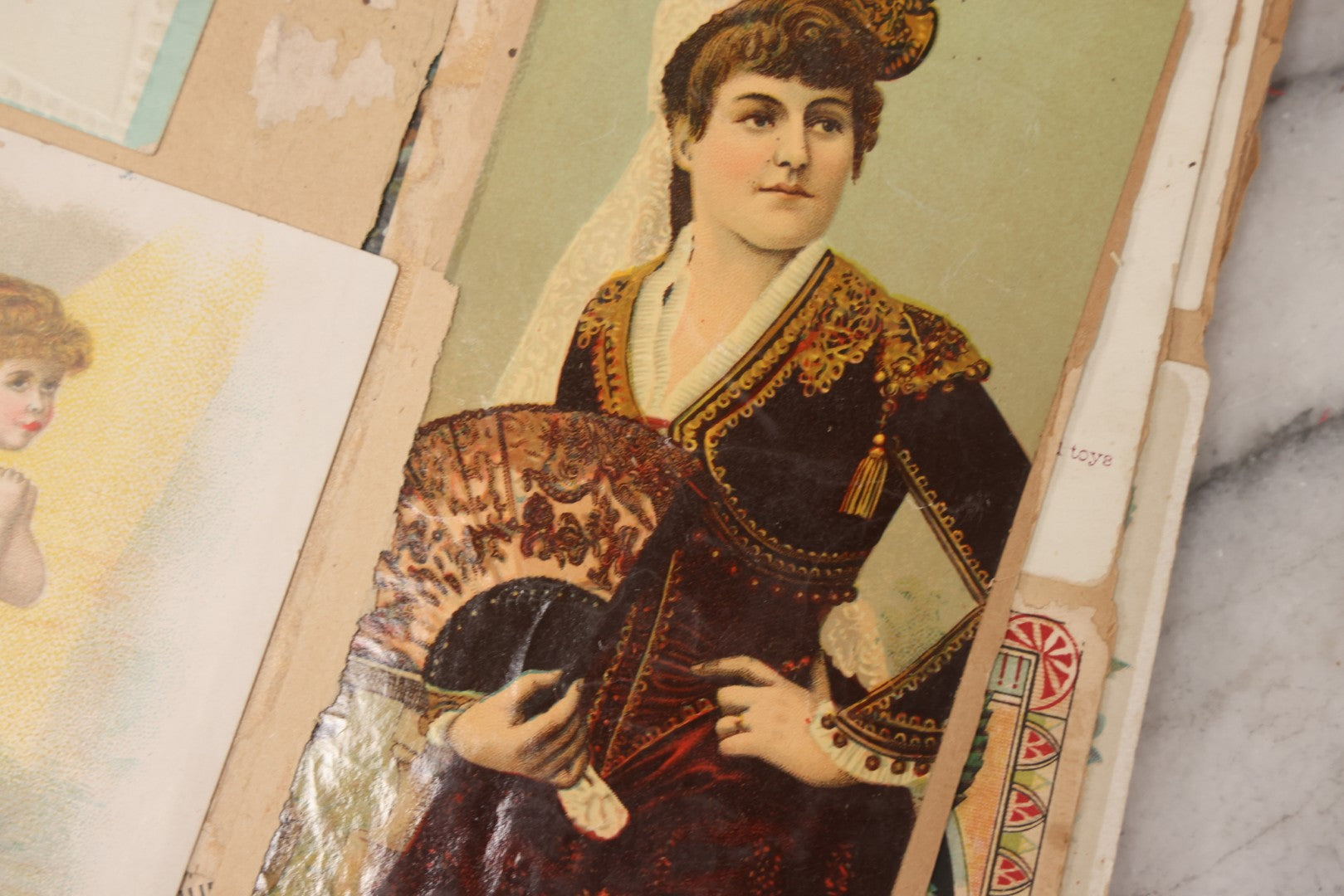 Lot 156 - Antique Victorian Trade Card And Die-Cut Scrapbook With Red Floral Cover, Containing 150+ Pieces, Pages Loose