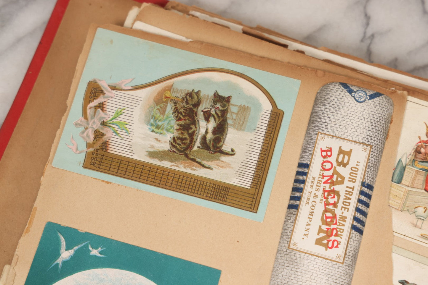 Lot 156 - Antique Victorian Trade Card And Die-Cut Scrapbook With Red Floral Cover, Containing 150+ Pieces, Pages Loose