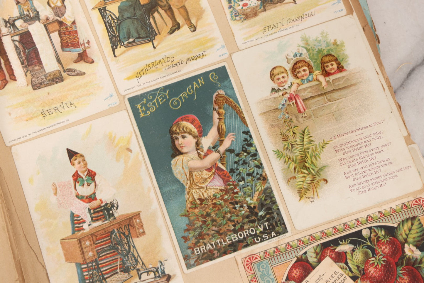 Lot 156 - Antique Victorian Trade Card And Die-Cut Scrapbook With Red Floral Cover, Containing 150+ Pieces, Pages Loose