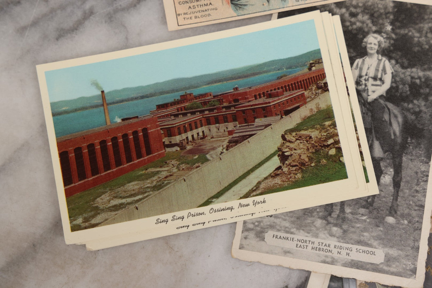 Lot 172 - Grouping Of 20+ Antique And Vintage Postcards And Ephemera Including Holiday Postcards, Sing Sing Prison Cards, Naumkeag Steam Cotton Co. Pamphlet, Salem, Massachusetts Brochure, Trade Cards, And More