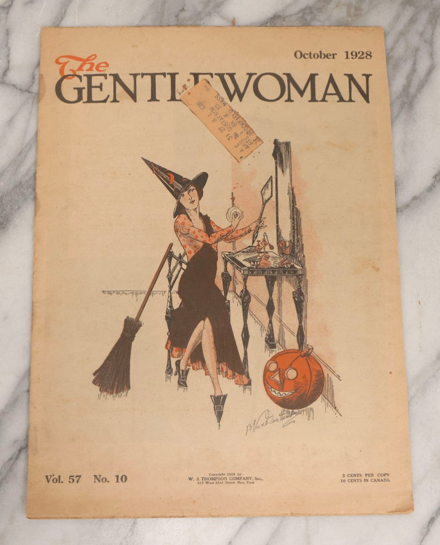 Lot 174 - Antique October 1928 Issue Of The Gentlewoman Magazine With Halloween Cover Of Woman Dressed As Witch Doing Her Makeup Beside A Jack-O-Lantern J.O.L., Copyrighted 1928 W. J. Thompson Company Inc., New York
