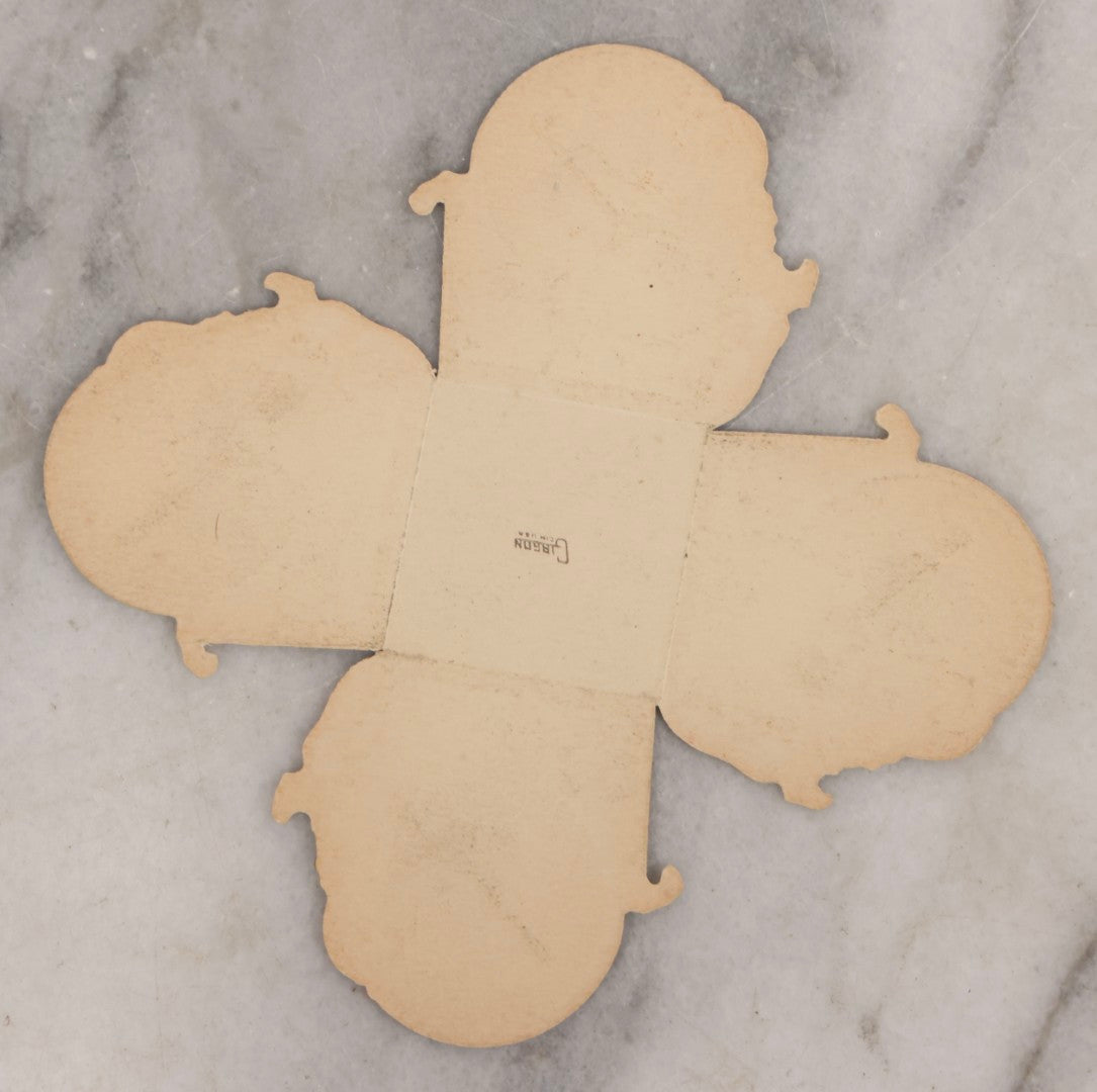 Lot 175 - Antique New Year's Eve Folding Paper Nut Cup With Cherub Playing Lute, By Gibson, U.S.A..