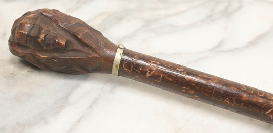 Lot 003 - Vintage Hand-Carved White Mountains, New Hampshire Folk Art Hiking Stick With Double-Sided Old Man Of The Mountain Carved Handle And Decades Of Carved Initials, Names, And Nicknames, 36" L