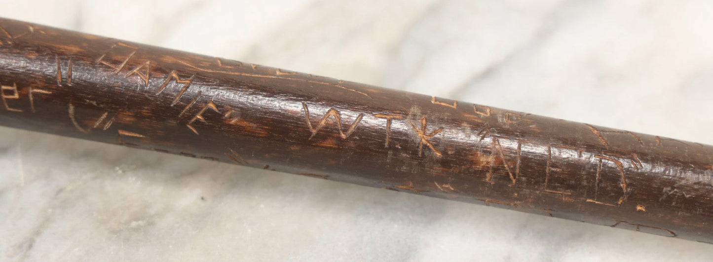 Lot 003 - Vintage Hand-Carved White Mountains, New Hampshire Folk Art Hiking Stick With Double-Sided Old Man Of The Mountain Carved Handle And Decades Of Carved Initials, Names, And Nicknames, 36" L