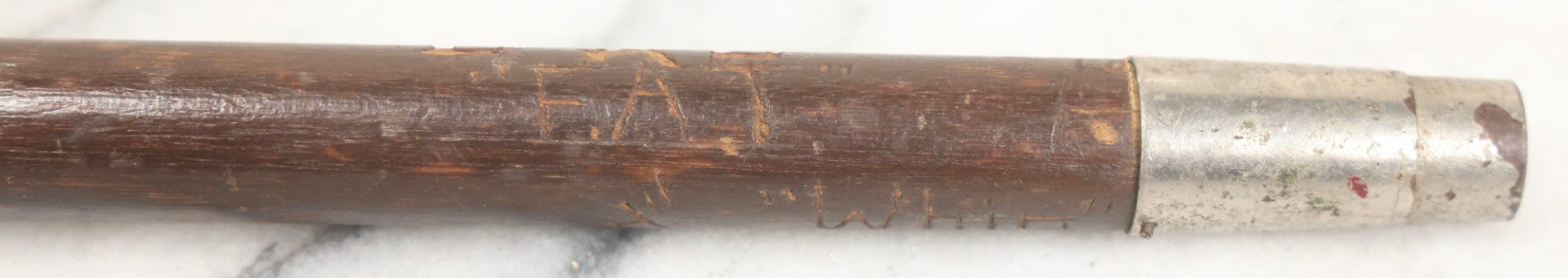 Lot 003 - Vintage Hand-Carved White Mountains, New Hampshire Folk Art Hiking Stick With Double-Sided Old Man Of The Mountain Carved Handle And Decades Of Carved Initials, Names, And Nicknames, 36" L