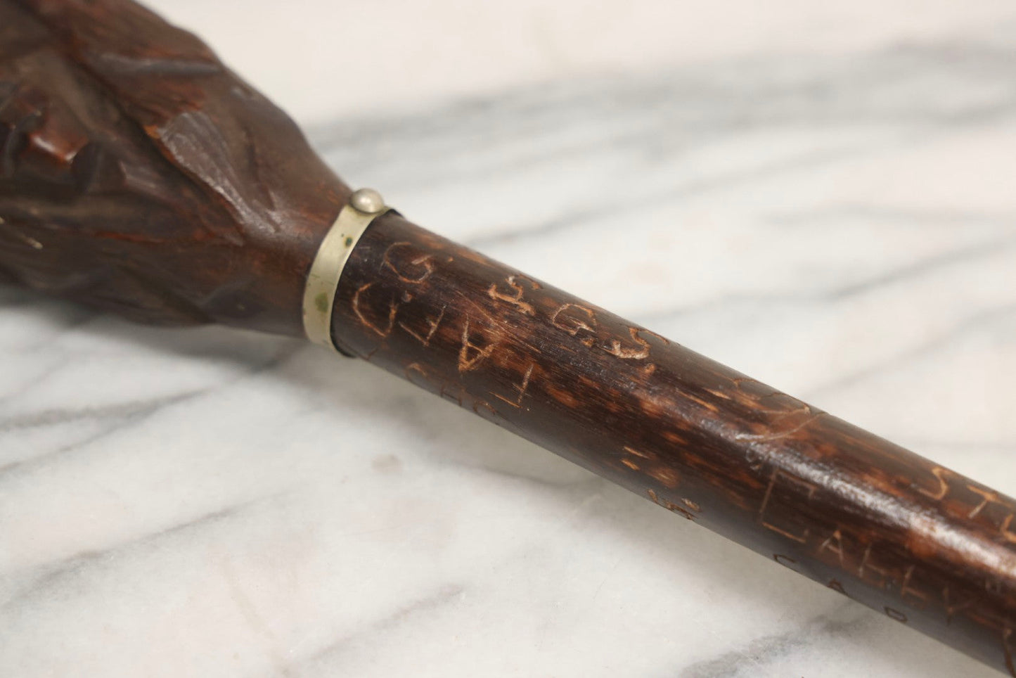 Lot 003 - Vintage Hand-Carved White Mountains, New Hampshire Folk Art Hiking Stick With Double-Sided Old Man Of The Mountain Carved Handle And Decades Of Carved Initials, Names, And Nicknames, 36" L