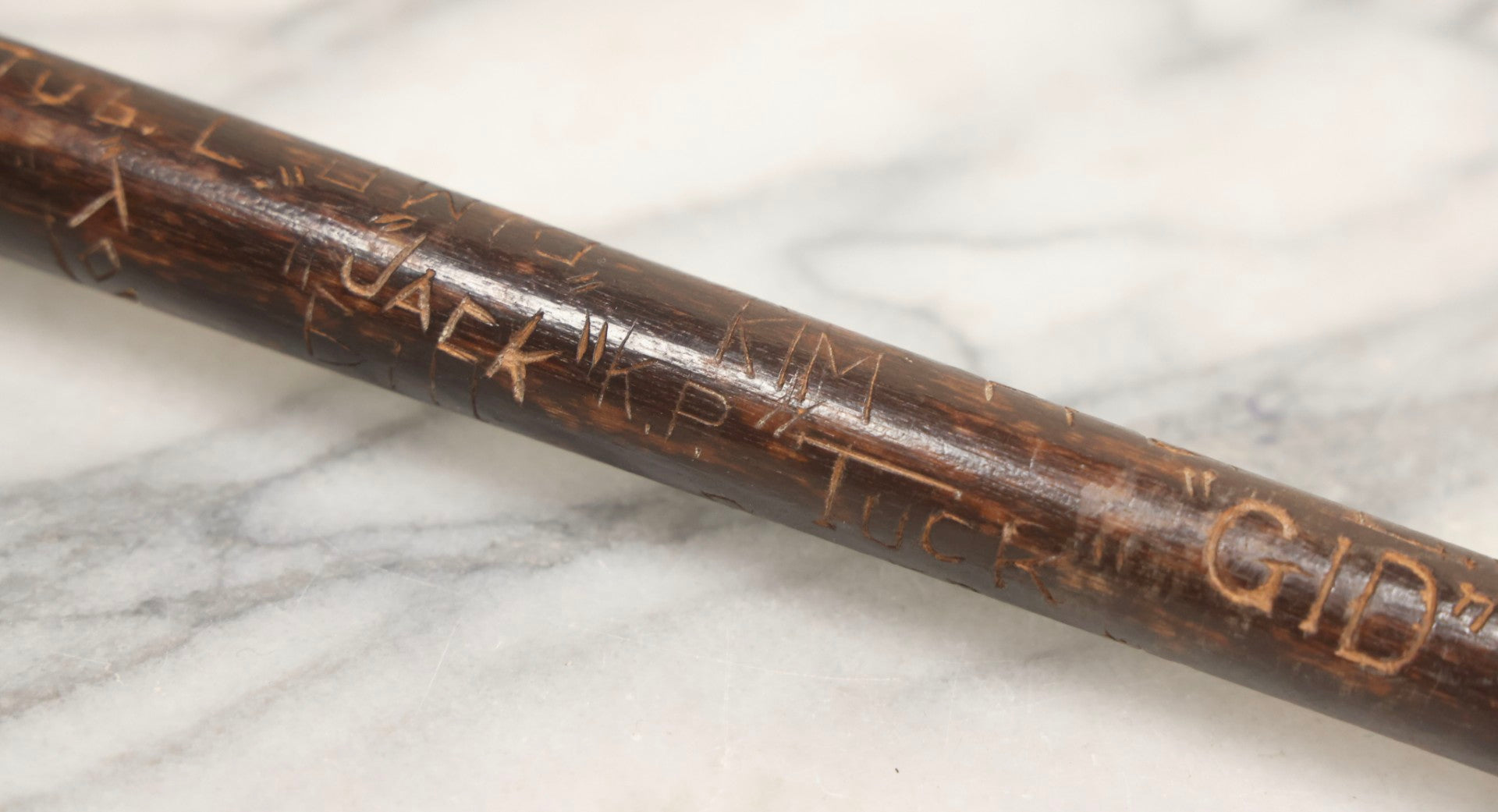 Lot 003 - Vintage Hand-Carved White Mountains, New Hampshire Folk Art Hiking Stick With Double-Sided Old Man Of The Mountain Carved Handle And Decades Of Carved Initials, Names, And Nicknames, 36" L