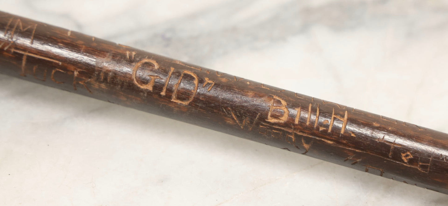 Lot 003 - Vintage Hand-Carved White Mountains, New Hampshire Folk Art Hiking Stick With Double-Sided Old Man Of The Mountain Carved Handle And Decades Of Carved Initials, Names, And Nicknames, 36" L