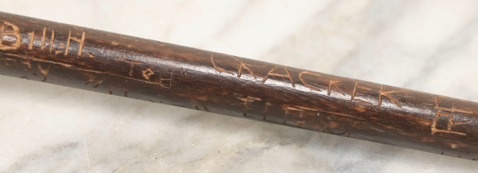 Lot 003 - Vintage Hand-Carved White Mountains, New Hampshire Folk Art Hiking Stick With Double-Sided Old Man Of The Mountain Carved Handle And Decades Of Carved Initials, Names, And Nicknames, 36" L