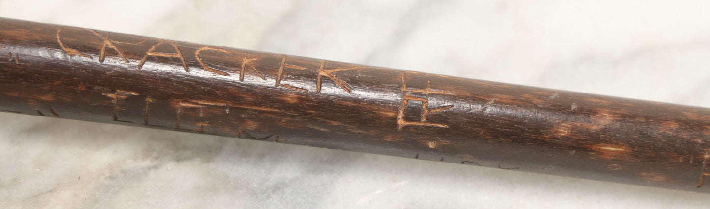 Lot 003 - Vintage Hand-Carved White Mountains, New Hampshire Folk Art Hiking Stick With Double-Sided Old Man Of The Mountain Carved Handle And Decades Of Carved Initials, Names, And Nicknames, 36" L