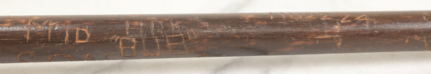 Lot 003 - Vintage Hand-Carved White Mountains, New Hampshire Folk Art Hiking Stick With Double-Sided Old Man Of The Mountain Carved Handle And Decades Of Carved Initials, Names, And Nicknames, 36" L