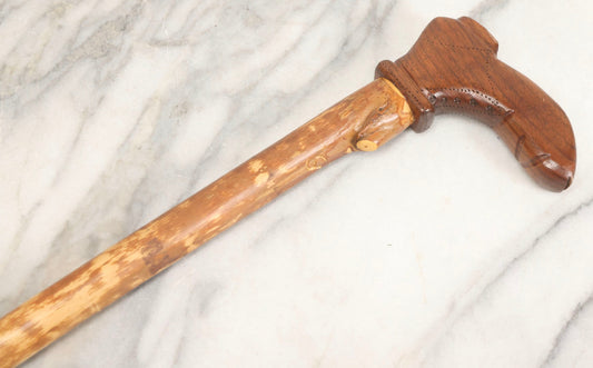 Lot 005 - Vintage Folk Art Cane With Carved Boot Handle And Natural Debarked Wood Shaft, 35-1/8" L