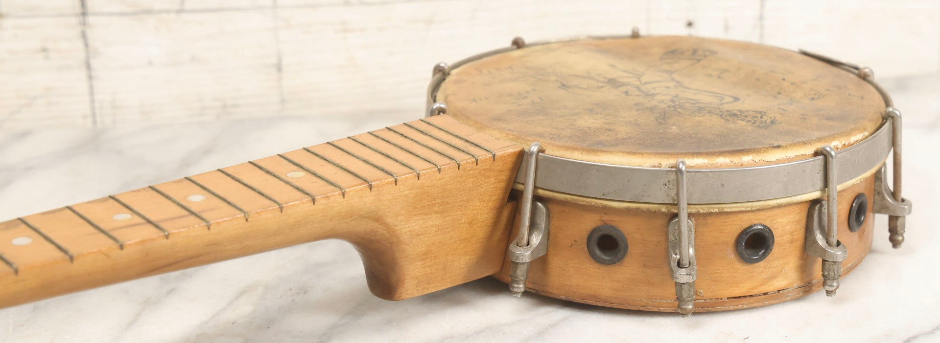 Lot 006 - Vintage Gretsch Clarophone Banjo Ukulele Banjolele With Folk Art Drawing On Head Of Cartoon Man Playing Instrument, Includes Canvas Carrying Bag, Circa 1930s