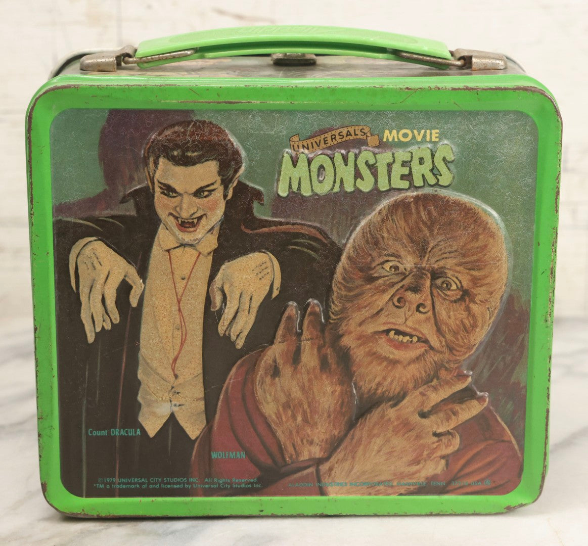 Lot 008 - Vintage Universal Movie Monsters Aladdin Brand Tin Lithograph Lunchbox Featuring Count Dracula, Wolf Man, Frankenstein, Mummy, Phantom Of The Opera, Creature From The Black Lagoon, Copyright 1979, Aladdin Industries Inc., Nashville, Tennessee