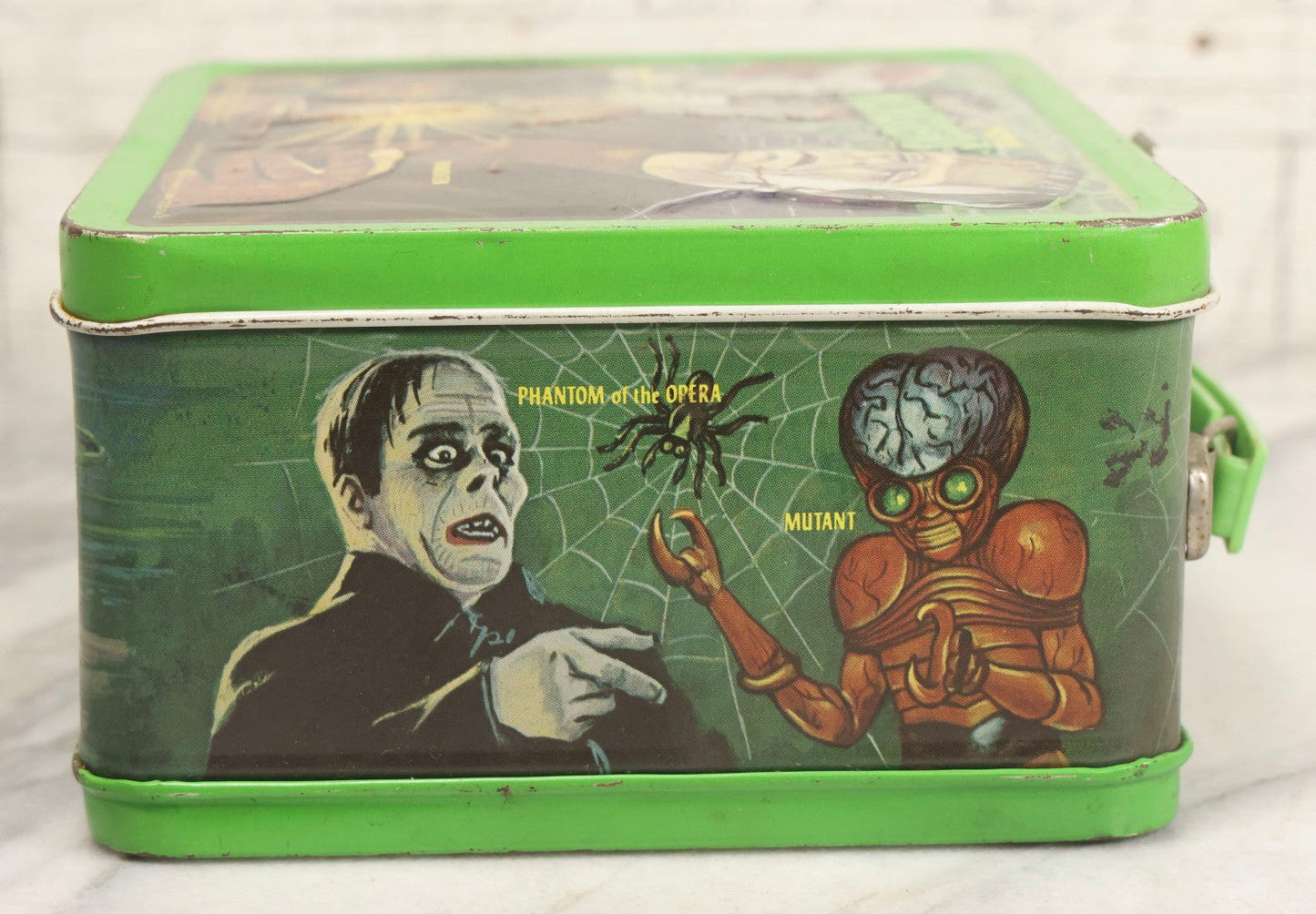 Lot 008 - Vintage Universal Movie Monsters Aladdin Brand Tin Lithograph Lunchbox Featuring Count Dracula, Wolf Man, Frankenstein, Mummy, Phantom Of The Opera, Creature From The Black Lagoon, Copyright 1979, Aladdin Industries Inc., Nashville, Tennessee