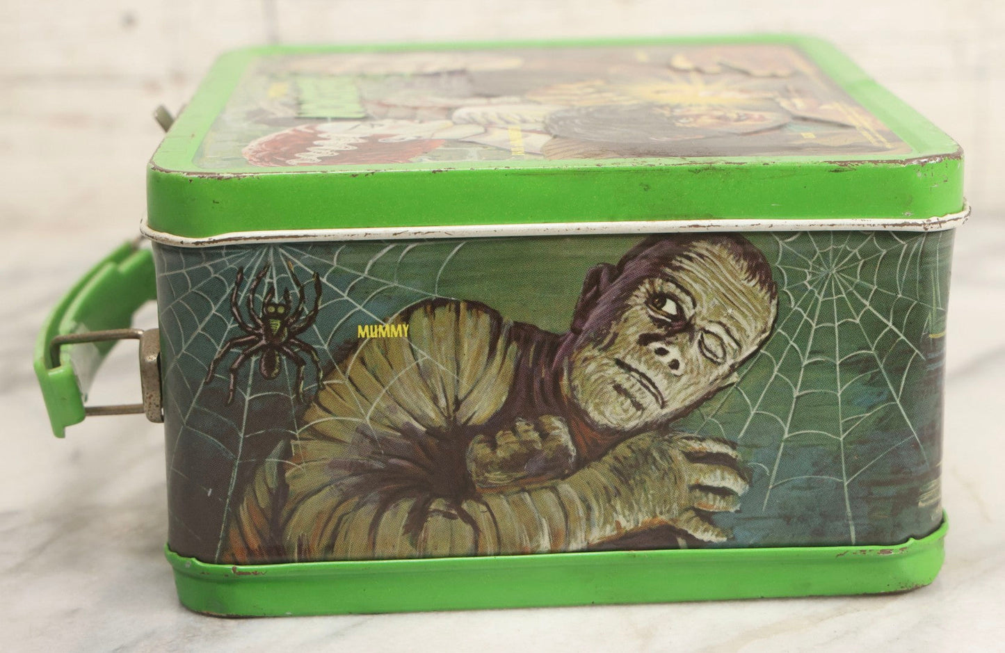 Lot 008 - Vintage Universal Movie Monsters Aladdin Brand Tin Lithograph Lunchbox Featuring Count Dracula, Wolf Man, Frankenstein, Mummy, Phantom Of The Opera, Creature From The Black Lagoon, Copyright 1979, Aladdin Industries Inc., Nashville, Tennessee