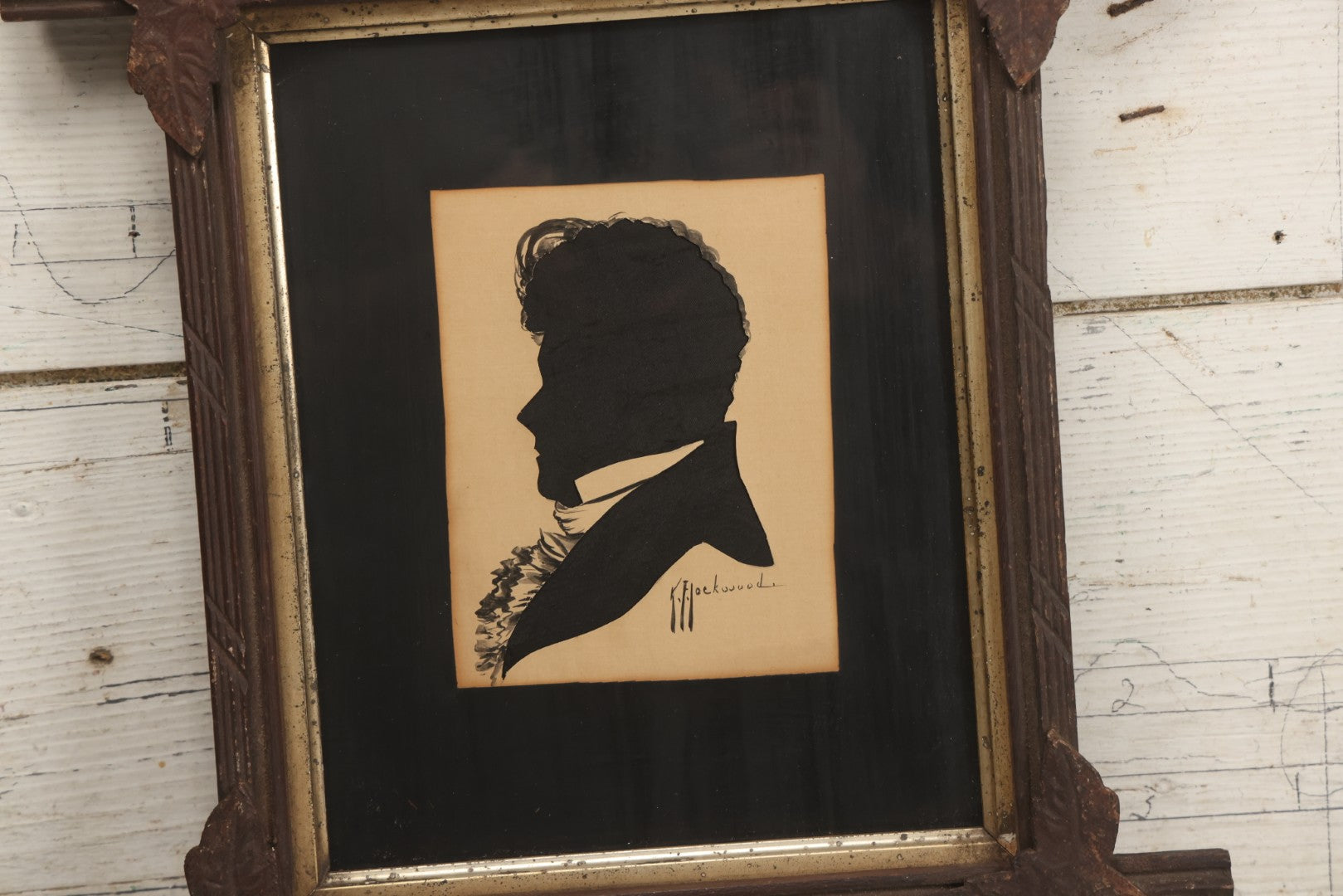 Lot 014 - Antique Hand-Cut And Hand-Painted Black Silk And Paper Silhouette Of Man In Profile With Cravat, Signed K.F. Lockwood, In Antique Wood Frame With Corner Ornaments, Circa 1850
