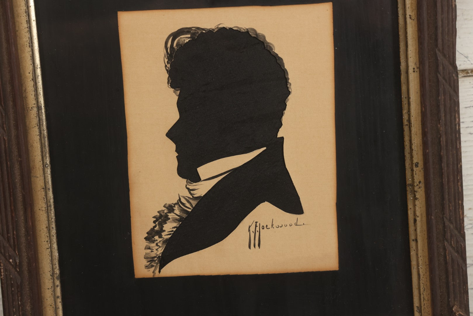 Lot 014 - Antique Hand-Cut And Hand-Painted Black Silk And Paper Silhouette Of Man In Profile With Cravat, Signed K.F. Lockwood, In Antique Wood Frame With Corner Ornaments, Circa 1850