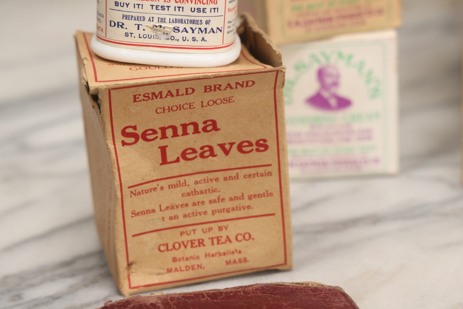 Lot 016 - Antique Traveling Salesman's Patent Medicine Case With Extensive Contents From T.M. Sayman Products Co., St. Louis, Missouri — Nos Vanishing Creams, Flavoring Extracts, Remedies, Ephemera & Sales Ledger