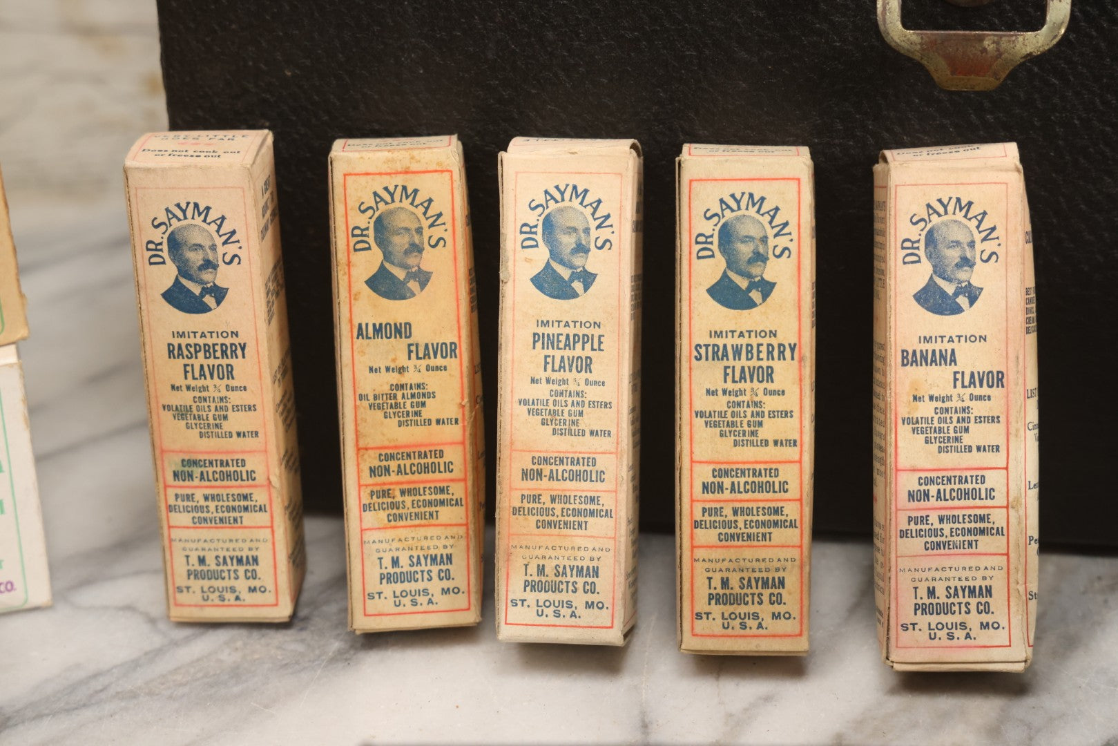 Lot 016 - Antique Traveling Salesman's Patent Medicine Case With Extensive Contents From T.M. Sayman Products Co., St. Louis, Missouri — Nos Vanishing Creams, Flavoring Extracts, Remedies, Ephemera & Sales Ledger