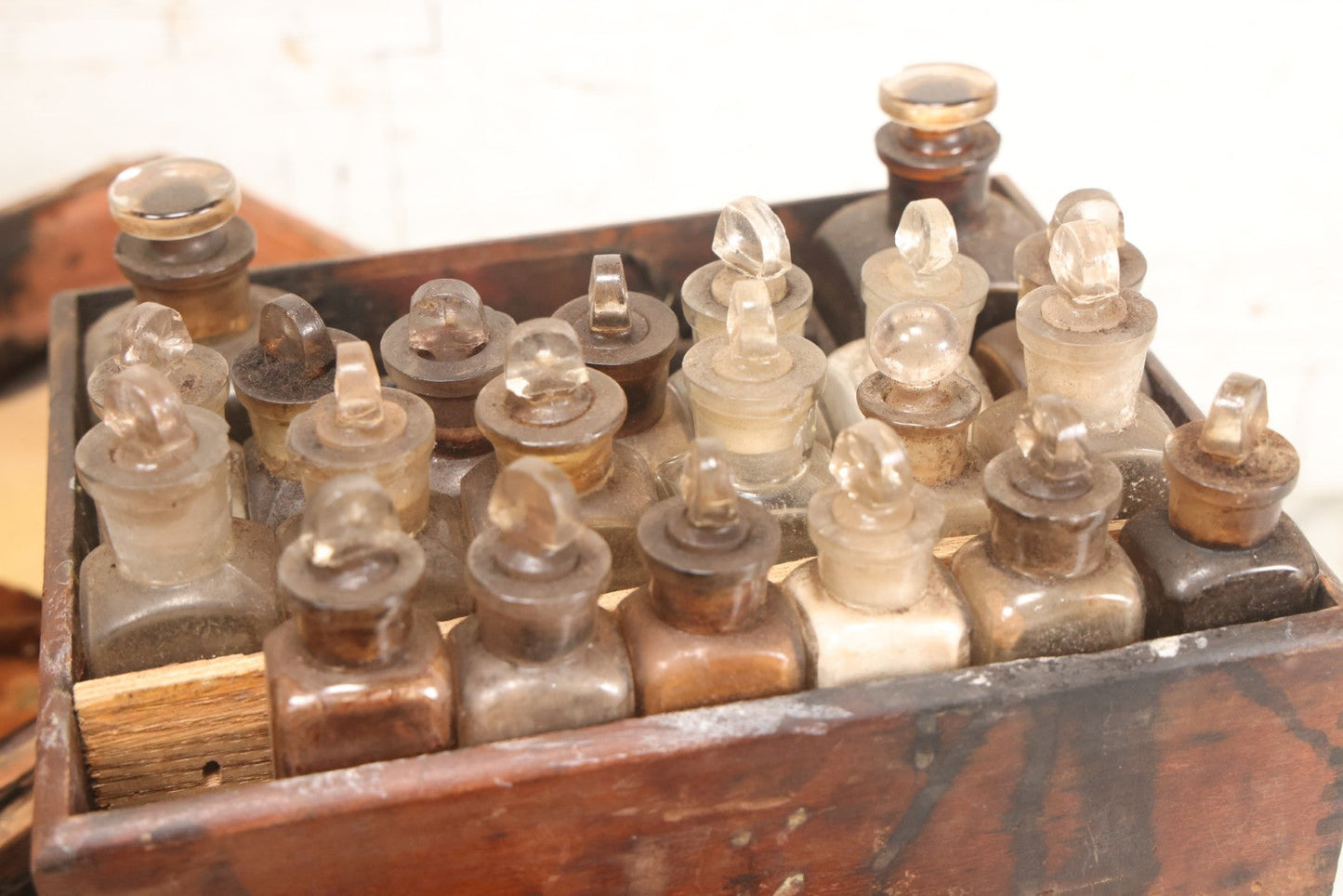 Lot 017 - Antique 19th Century Traveling Apothecary Kit In Leather-Wrapped Wood Box Stamped “Hoff's Patent, March 27, 1883,” With 20+ Glass Medicine Bottles And Internal Till