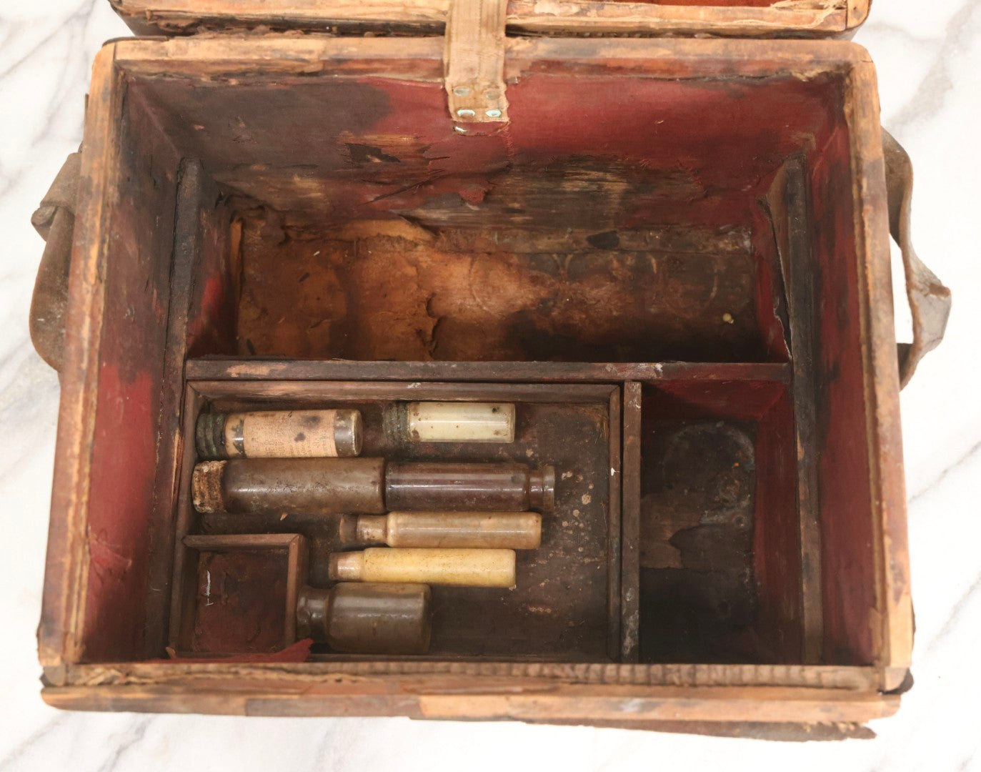 Lot 017 - Antique 19th Century Traveling Apothecary Kit In Leather-Wrapped Wood Box Stamped “Hoff's Patent, March 27, 1883,” With 20+ Glass Medicine Bottles And Internal Till