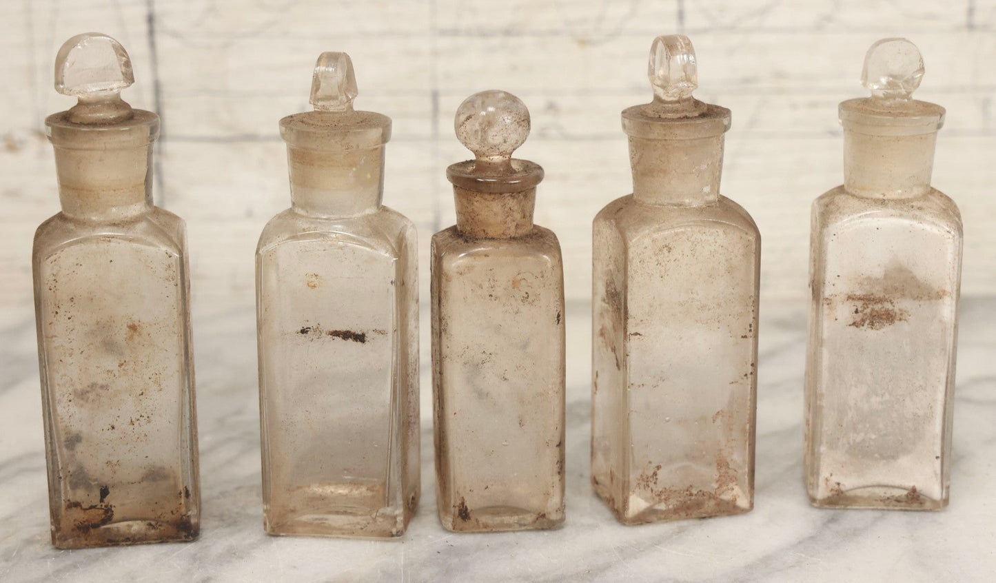 Lot 017 - Antique 19th Century Traveling Apothecary Kit In Leather-Wrapped Wood Box Stamped “Hoff's Patent, March 27, 1883,” With 20+ Glass Medicine Bottles And Internal Till