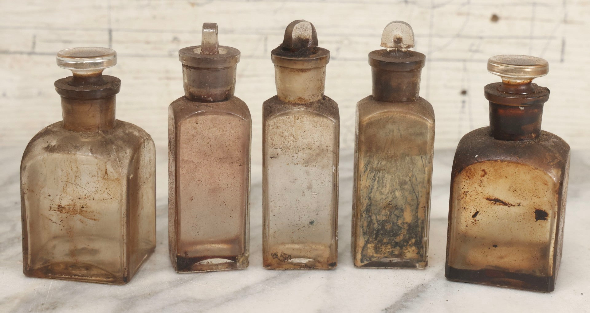 Lot 017 - Antique 19th Century Traveling Apothecary Kit In Leather-Wrapped Wood Box Stamped “Hoff's Patent, March 27, 1883,” With 20+ Glass Medicine Bottles And Internal Till