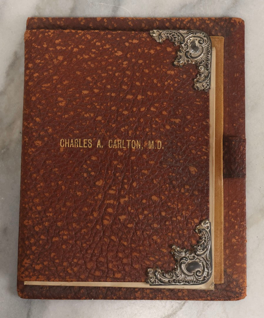 Lot 019 - Antique Leather-Covered Prescription Pad Belonging To Charles A. Carlton, M.D., Salem, Massachusetts, With Decorative Sterling Silver Corners And Unused Prescription Paper