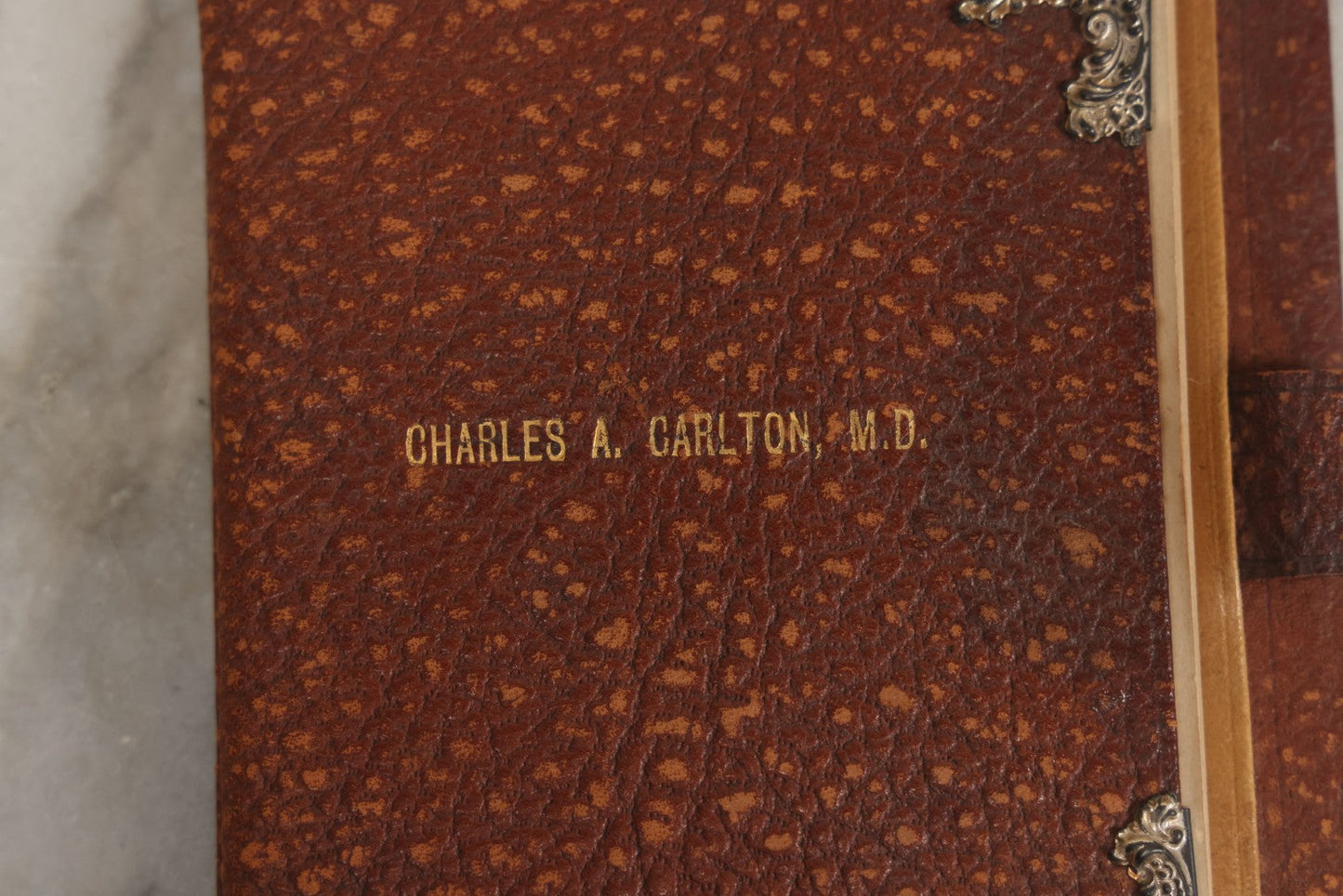 Lot 019 - Antique Leather-Covered Prescription Pad Belonging To Charles A. Carlton, M.D., Salem, Massachusetts, With Decorative Sterling Silver Corners And Unused Prescription Paper