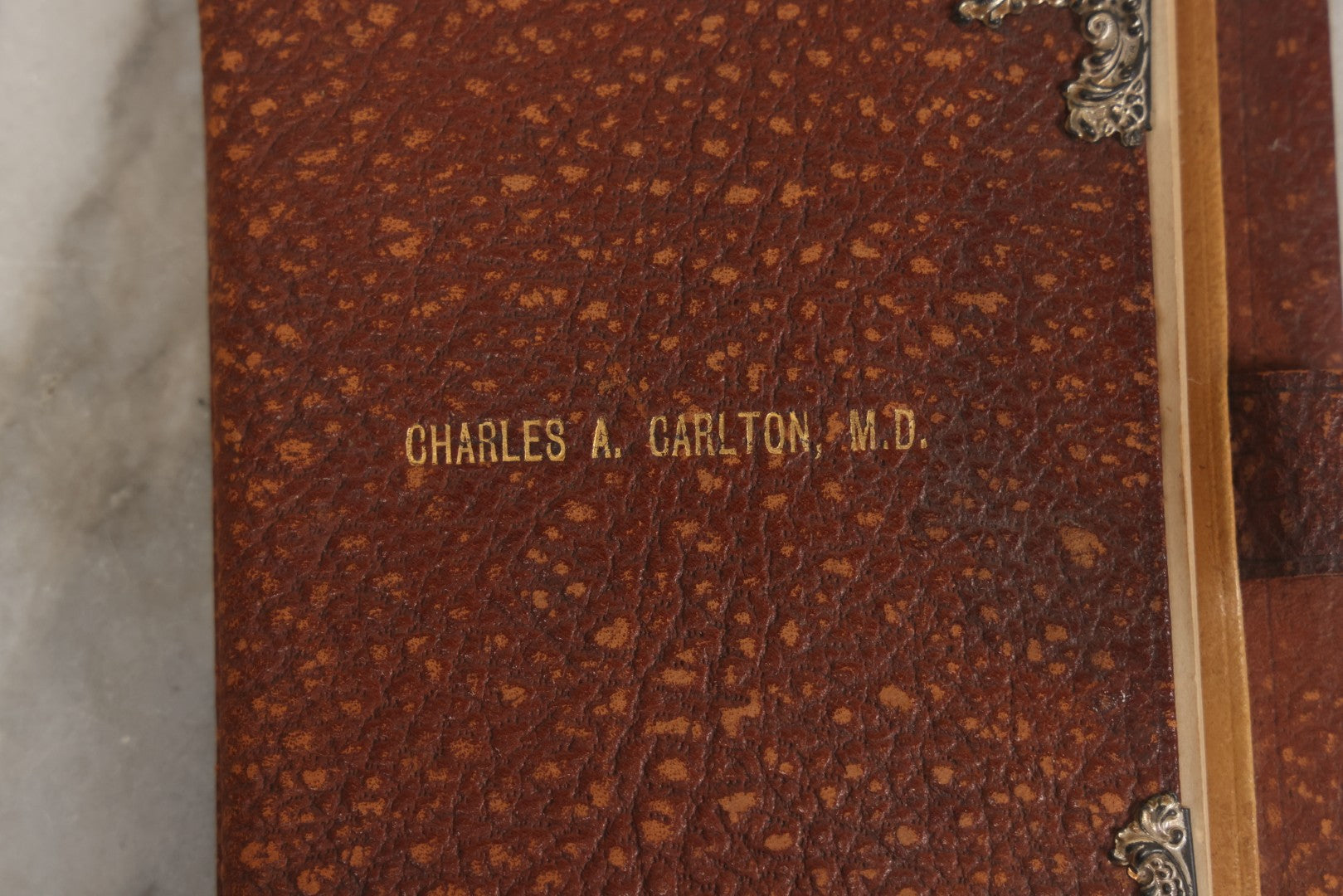 Lot 019 - Antique Leather-Covered Prescription Pad Belonging To Charles A. Carlton, M.D., Salem, Massachusetts, With Decorative Sterling Silver Corners And Unused Prescription Paper