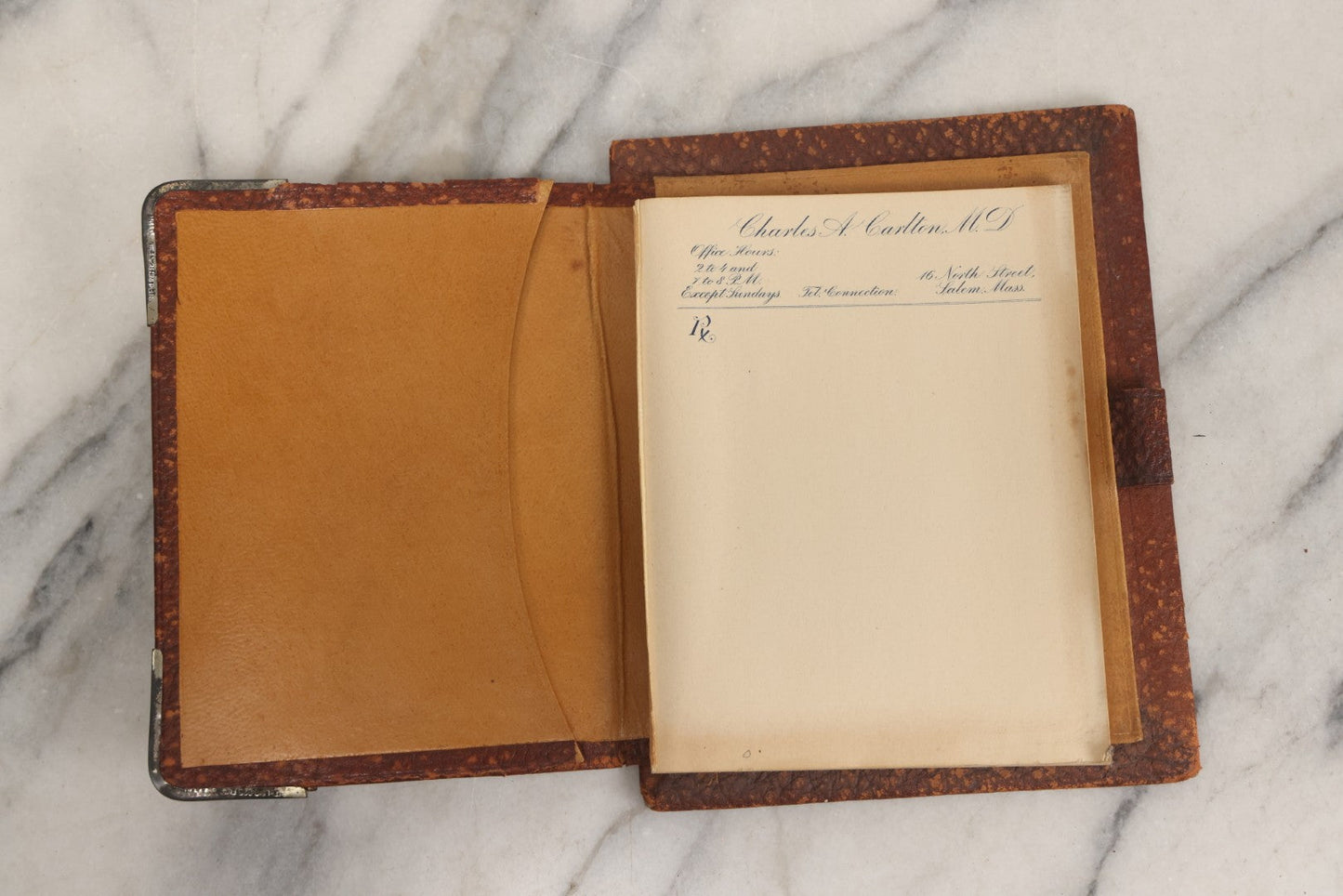 Lot 019 - Antique Leather-Covered Prescription Pad Belonging To Charles A. Carlton, M.D., Salem, Massachusetts, With Decorative Sterling Silver Corners And Unused Prescription Paper