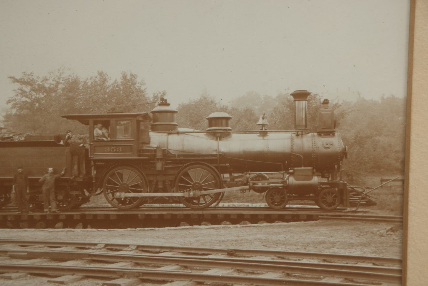 Lot 023 - Antique Photograph Of Steam Locomotive #353 With Four Crew Members On Turntable At Railroad Depot, In Carved Wood Frame, 14-7/8" x 12-5/8"