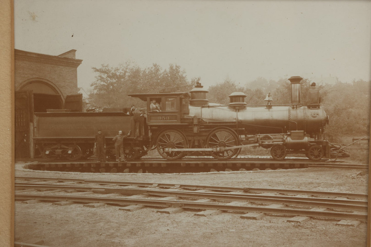 Lot 023 - Antique Photograph Of Steam Locomotive #353 With Four Crew Members On Turntable At Railroad Depot, In Carved Wood Frame, 14-7/8" x 12-5/8"
